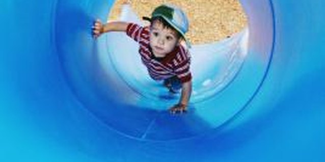 Jupiterimages/Brand X Pictures/Getty Images Climbing is an engaging toddler activity.