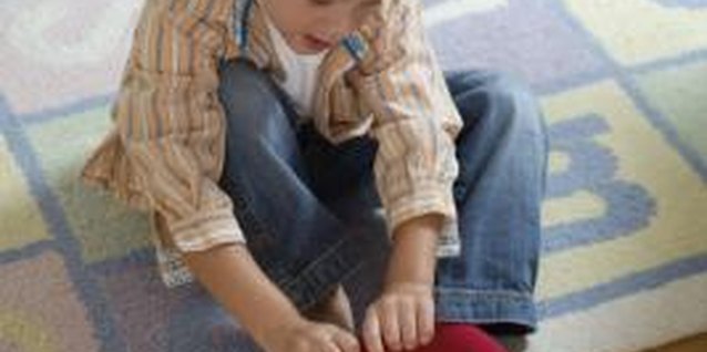 Jupiterimages/Brand X Pictures/Getty Images Offer sincere praise when your child gets it right.