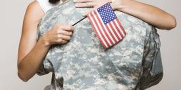 Jupiterimages/Creatas/Getty Images Looking good for your husband when he returns home can set the tone for your reunion.