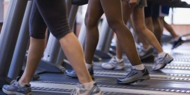 Jupiterimages/Comstock/Getty Images Pick up the pace on the treadmill to experience weight-loss results.