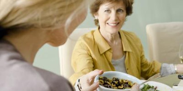 Jupiterimages/Pixland/Getty Images Being yourself is important when meeting your boyfriend's mom.