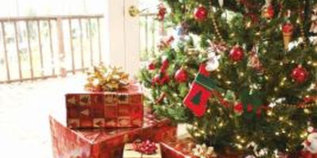 Thinkstock/Comstock/Getty Images Keep your toddler safe this holiday season by keeping the Christmas tree out of reach of curious hands.