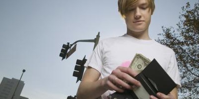 Jupiterimages/Brand X Pictures/Getty Images Asking a friend to borrow money could be an awkward conversation to have.