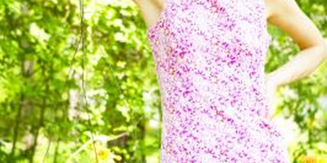 Jupiterimages/Photos.com/Getty Images Elevate your flowers off the ground with a simple shepherd's hook.