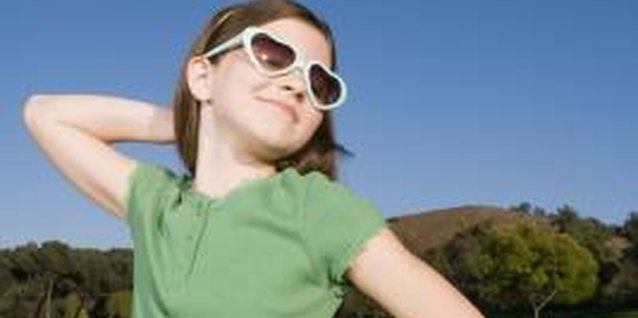 Jupiterimages/Creatas/Getty Images Confidence is displayed in a child's posture.
