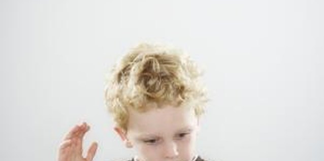 Thomas Northcut/Digital Vision/Getty Images Encourage your child's interest in drumming with a variety of activities.