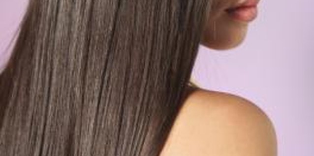Digital Vision/Digital Vision/Getty Images A weave that looks healthy and natural after straightening.
