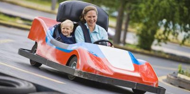 Creatas Images/Creatas/Getty Images Go-karts might be the perfect celebration for your little one.