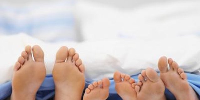 Stockbyte/Stockbyte/Getty Images If co-sleeping feels right for you, it might improve your child's self-esteem.