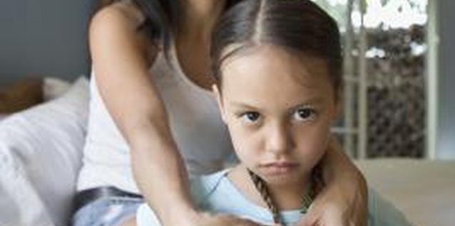 Thinkstock Images/Comstock/Getty Images Kids resent parents who hover over their every move.