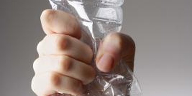 Jupiterimages/Goodshoot/Getty Images Don't crush your plastic water bottles. Instead, turn them in to ways to entertain your kids.