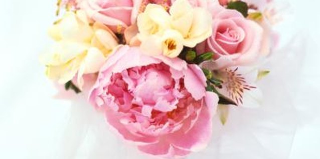 Stockbyte/Stockbyte/Getty Images Get the kids to help you gather long-lasting, cut peonies.
