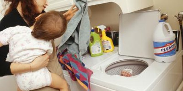 Buccina Studios/Photodisc/Getty Images Bleach can strip clothing of dyes and burn your skin.