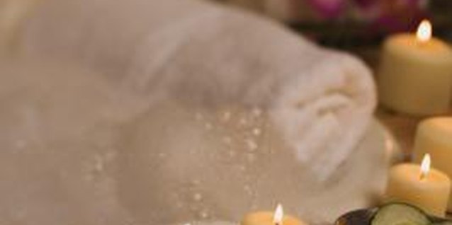 Comstock Images/Comstock/Getty Images Add candles and roll up towels to make your bathroom a peaceful retreat.