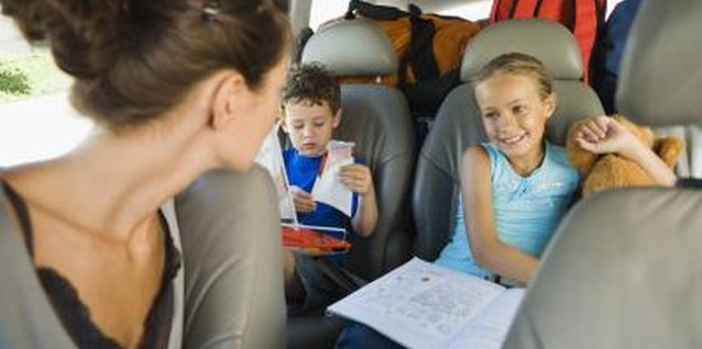 Jupiterimages/Pixland/Getty Images Children must ride in boosters up to a certain height, weight or age in many states.