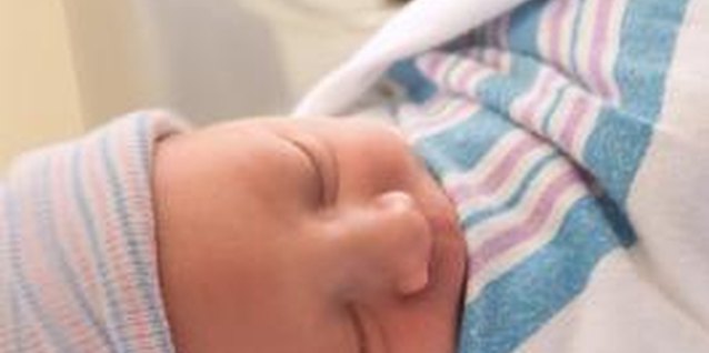 Jupiterimages/Comstock/Getty Images Hospitals know all the secrets, often swaddling newborns to help them relax.