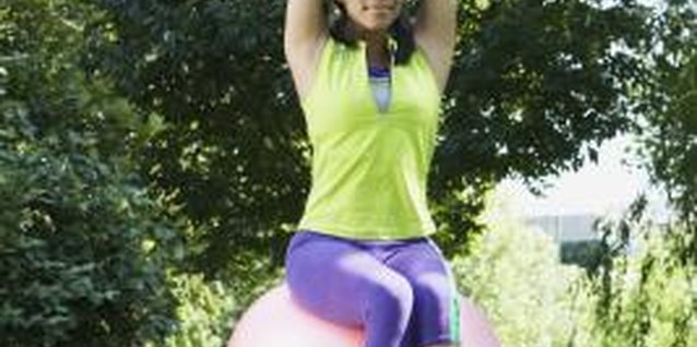 Jupiterimages/Brand X Pictures/Getty Images Footless tights allow for more movement when you exercise.