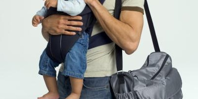 Jupiterimages/liquidlibrary/Getty Images Making your own diaper bag can save you money.