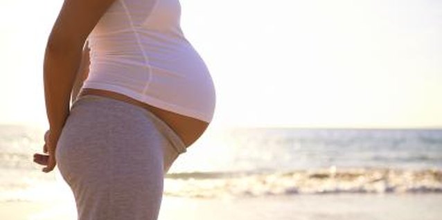 Jupiterimages/Comstock/Getty Images Inducing labor is usually safe but isn't without risks.