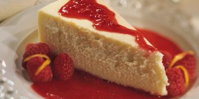 Comstock/Comstock/Getty Images Top cheesecake with whole, frozen berries or a berry sauce.
