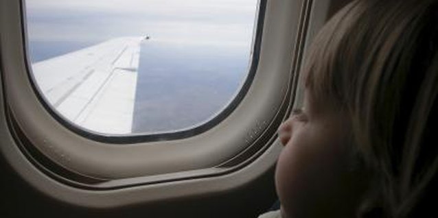 Ablestock.com/AbleStock.com/Getty Images Even minors need a passport to travel to another country.