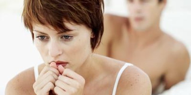 Stockbyte/Stockbyte/Getty Images Your guy might still be in love with his ex.