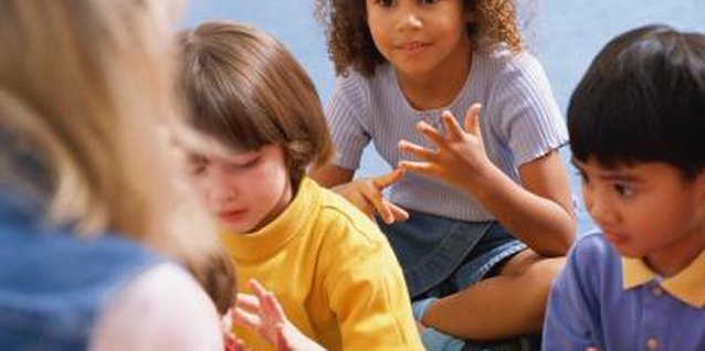 Stockbyte/Stockbyte/Getty Images Singing "Five Green and Speckled Frogs" introduces numbers and subtraction to preschoolers.
