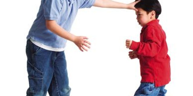 Photodisc/Photodisc/Getty Images A younger child decides to take a stand against his brother's attempts to bully him.