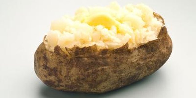 Jupiterimages/Photos.com/Getty Images A potato presents potential for deliciousness.