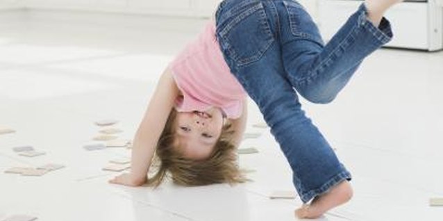 Jupiterimages/Comstock/Getty Images Improve your toddler's motor skills with helpful exercises.