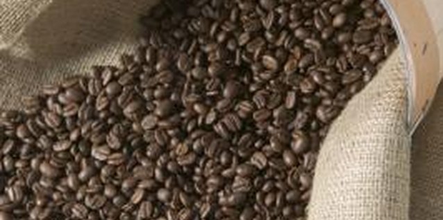 Jupiterimages/liquidlibrary/Getty Images Printed burlap coffee sacks turn into themed curtains with no sewing needed.