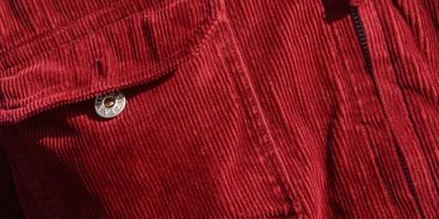 Jupiterimages/Photos.com/Getty Images Snap all pockets on corduroy pants before washing to keep the pocket shape.