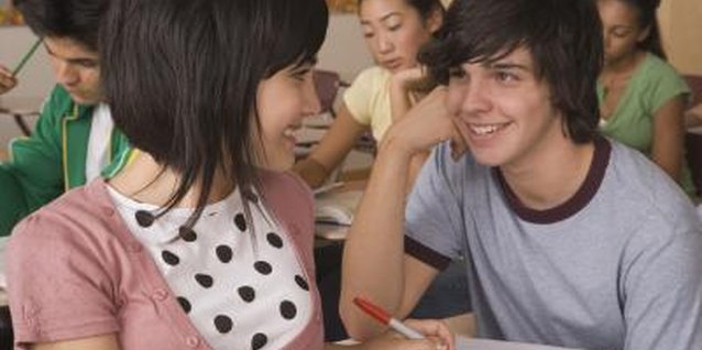 Jupiterimages/Brand X Pictures/Getty Images Help your teens pass the time with a creative paper-and-pen activity.