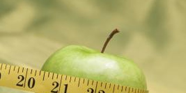 Comstock Images/Comstock/Getty Images Pick up a nutrient-dense apple instead of a cookie to satisfy your snack attack.