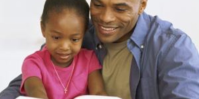 Stockbyte/Stockbyte/Getty Images Reading the Bible helps children hear God's voice.