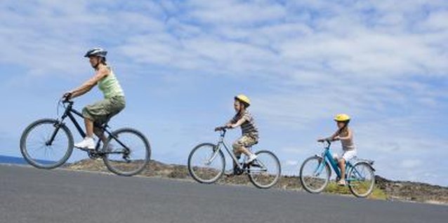 Polka Dot Images/Polka Dot/Getty Images Uphill cycling adds strength to your legs.