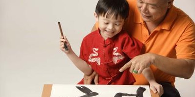 Jupiterimages/Goodshoot/Getty Images There are many ways to work on fine motor skills, such as through games and activities.