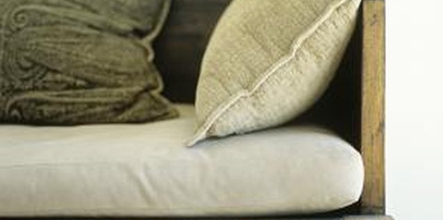 Stockbyte/Stockbyte/Getty Images Make neutral-colored fabric cushions to blend in with any decor.