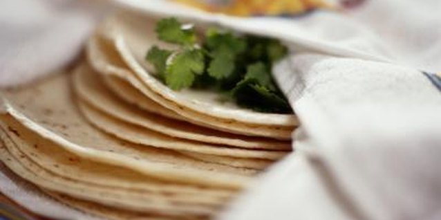 Ryan McVay/Photodisc/Getty Images Save any broken tortilla pieces in your freezer to make dumplings.