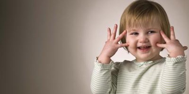 Jupiterimages/Polka Dot/Getty Images Once your little one finds her voice, she'll fill the house with song.