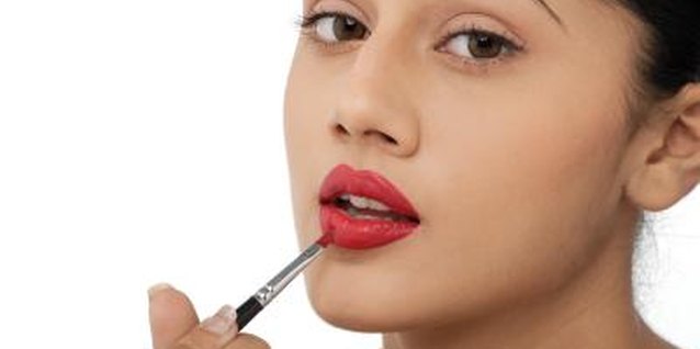 Visage/Stockbyte/Getty Images Lip Tar offers opaque coverage for bold lips.