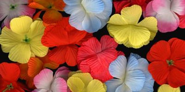 Thinkstock Images/Comstock/Getty Images Use wire cutters to snip silk flowers from their vinyl stems.
