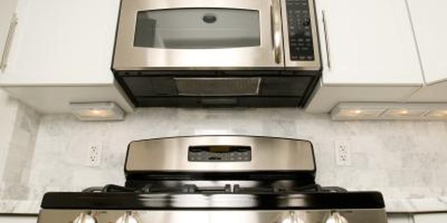 Jupiterimages/Photos.com/Getty Images Use your microwave to cook a variety of different foods.