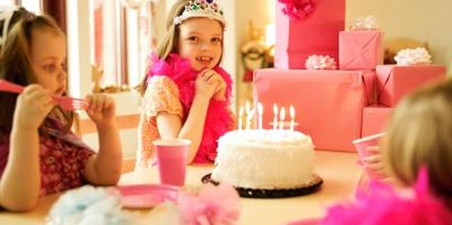 Jupiterimages/Photos.com/Getty Images Occupy your little party guests with simple fantasy crafts.