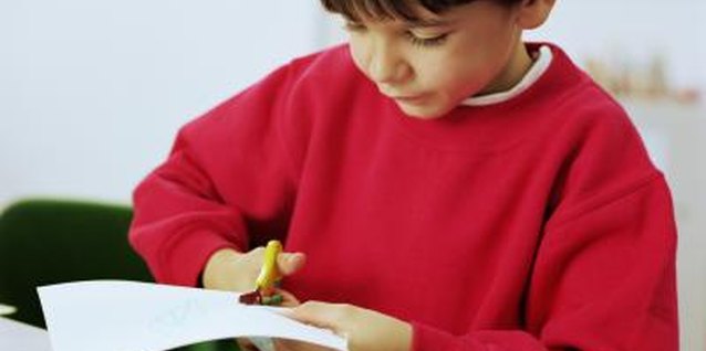 Katy McDonnell/Digital Vision/Getty Images Skilled scissor use is an important part of many early childhood projects.