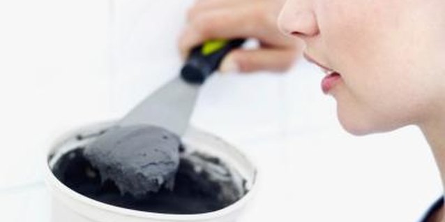 Stockbyte/Stockbyte/Getty Images Getting the correct grout mix ratio is a piece of cake.