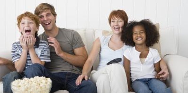 Jupiterimages/Pixland/Getty Images Foster parents receive state aid to help defray the costs of caring for their child.