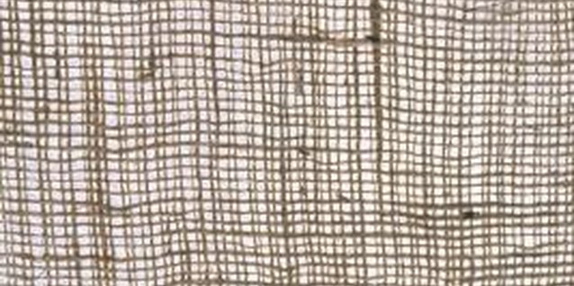 Dick Luria/Photodisc/Getty Images Burlap is made of natural plant fibers with a distinctive appearance.
