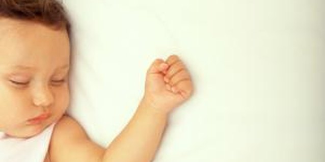 Brand X Pictures/Brand X Pictures/Getty Images Use a nightly checklist to get a happy, sleeping child.