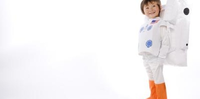 BananaStock/BananaStock/Getty Images Make an astronaut's costume and your youngster is ready to explore the stars.